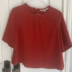 Rachel Roy burnt orange top in small